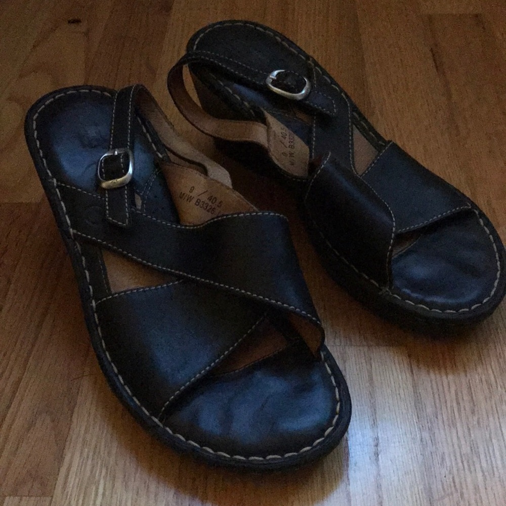 Black leather wedge wide strap sandals.